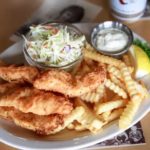 Chicken strips, fries, and coleslaw at Cruiser Cafe